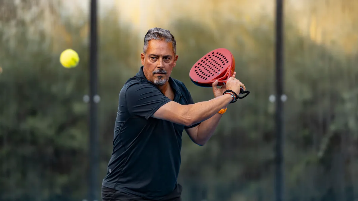 Julian preparing a two-handed backhand