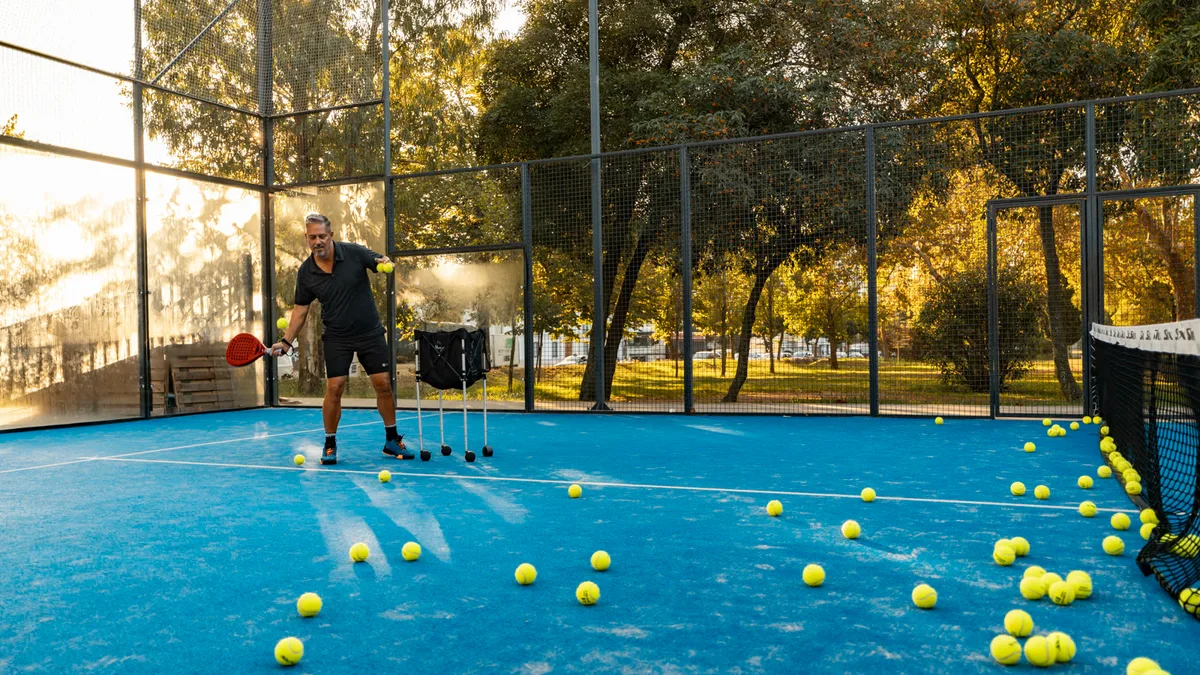Julian coaching on a padel court
